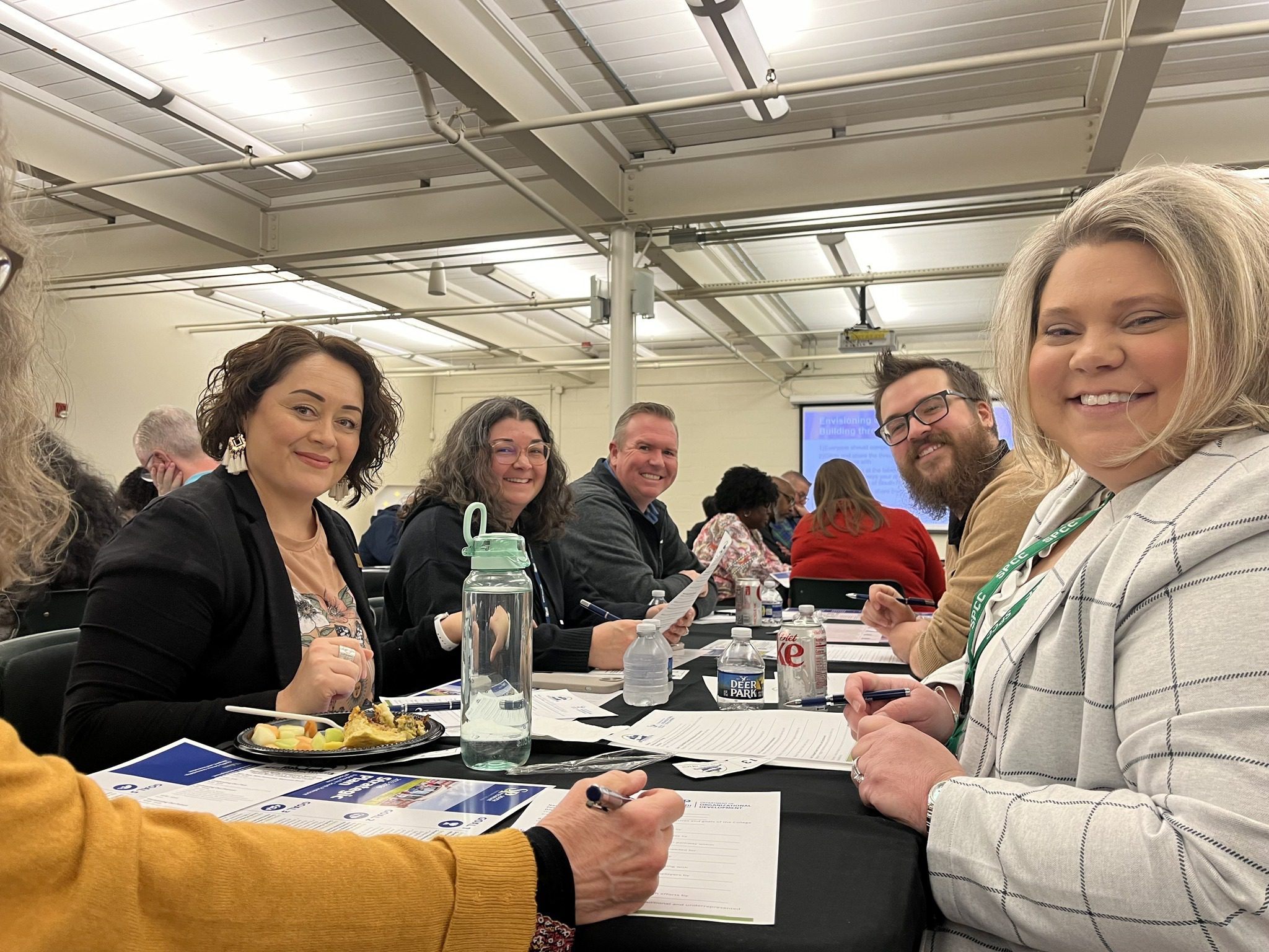 Group of South Piedmont employees at a table at the Lockhart-Taylor Center in Wadesboro. 