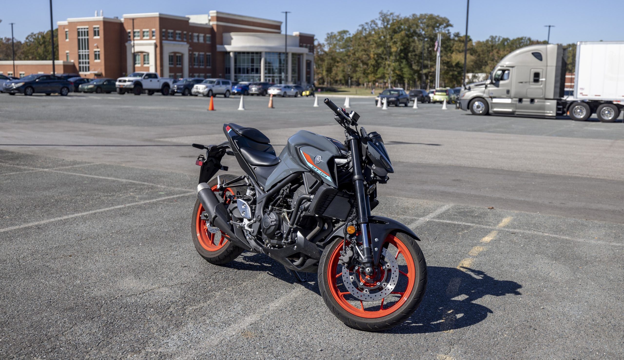Motorcycle parked in the lot outside South Piedmont's Old Charlotte Highway (OCH) Main building.