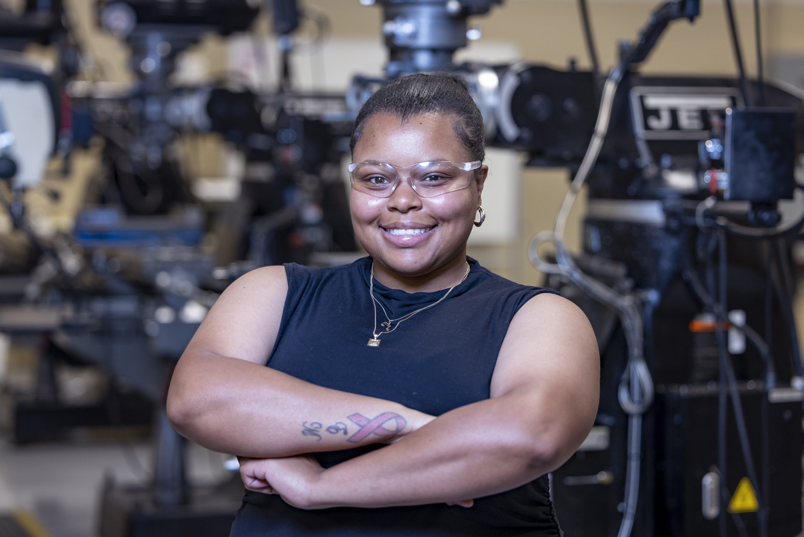 Work-based learning student posing with her arms-crossed.