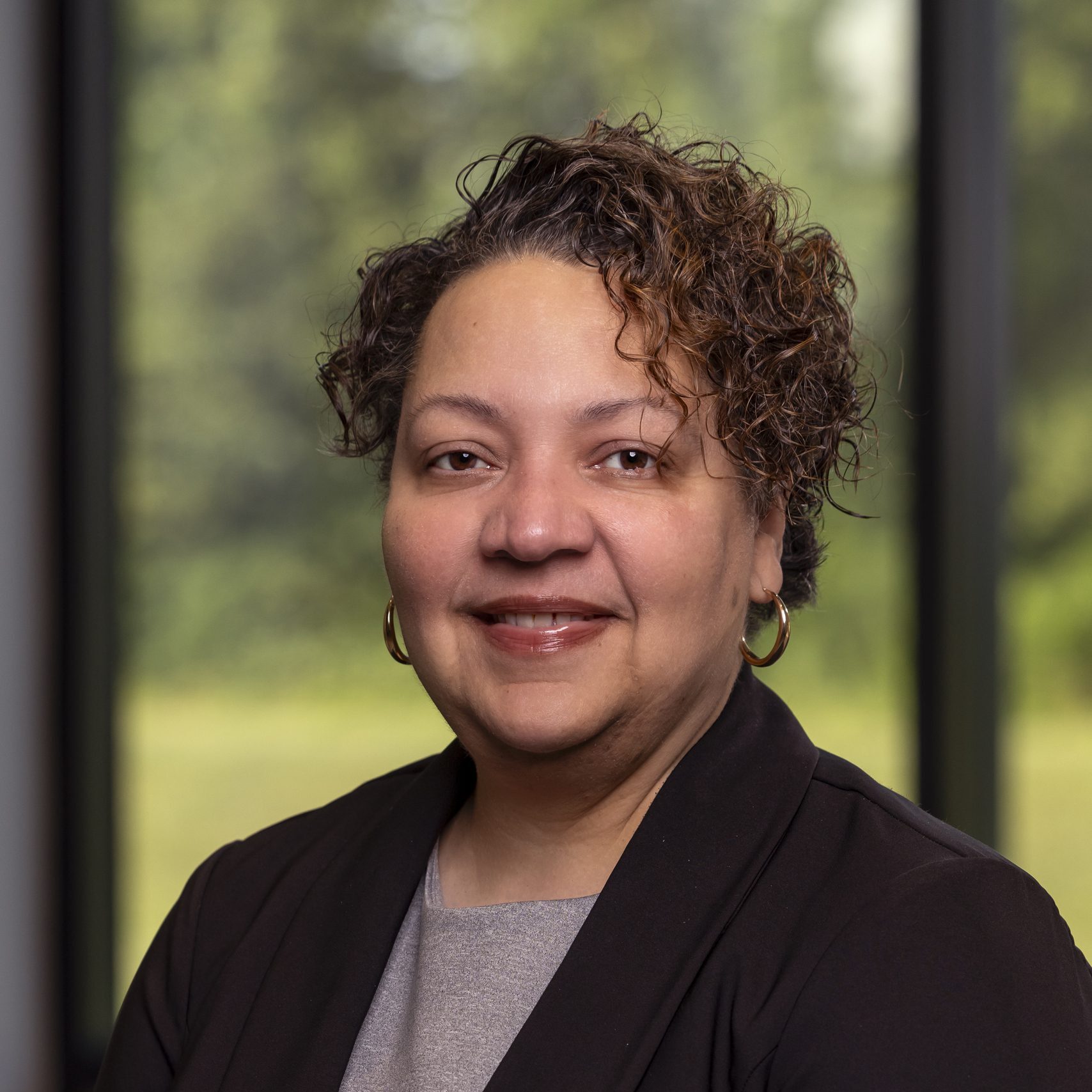 Professional headshot of Debbie Normandia-Berrios