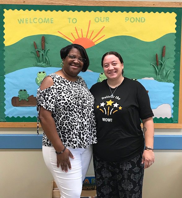 Damita Moss, left, posing with another South Piedmont student.