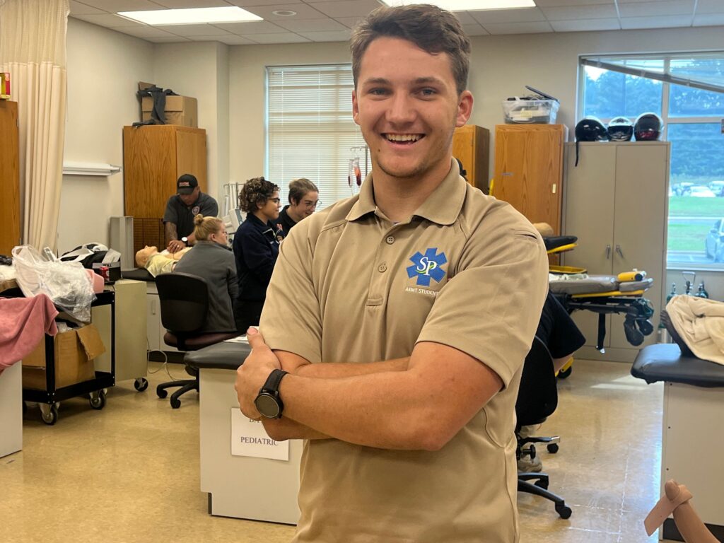 Tyler Shoffner posing inside the Braswell classroom.