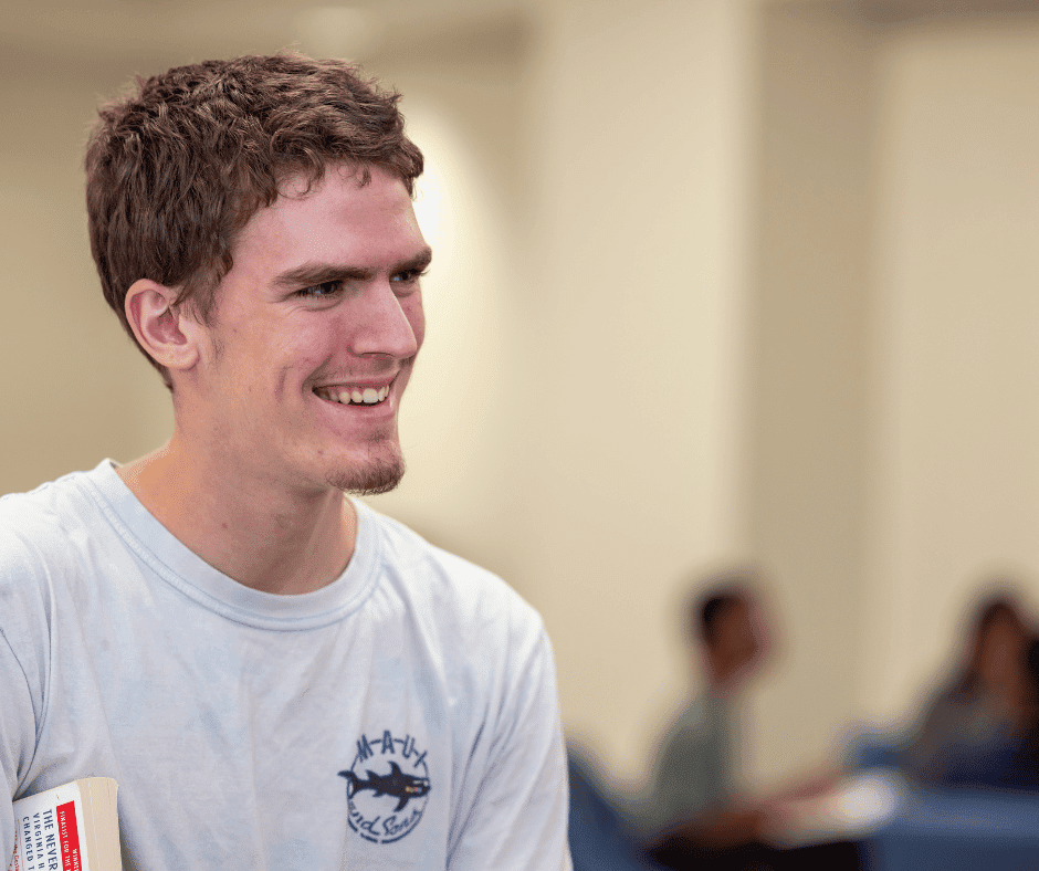 Photo of a male student smiling.