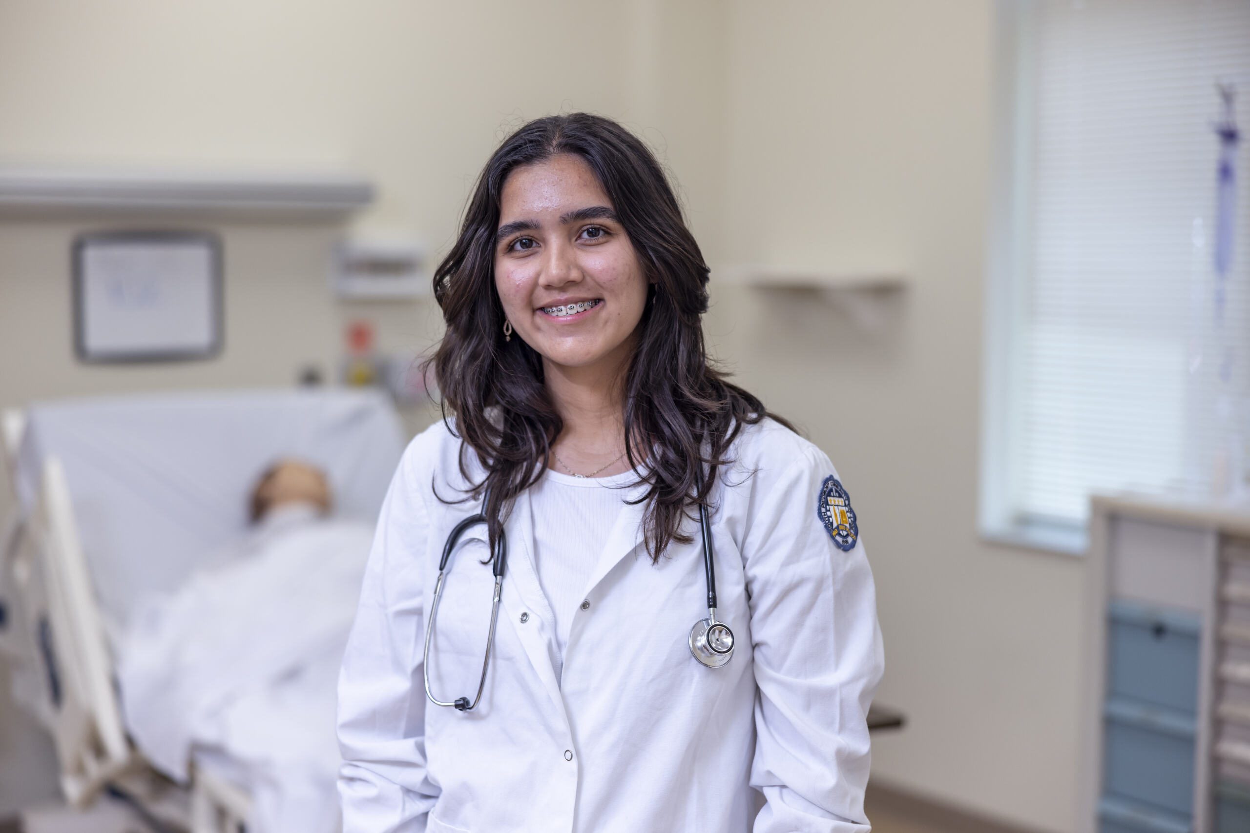 Student in a medical gown.