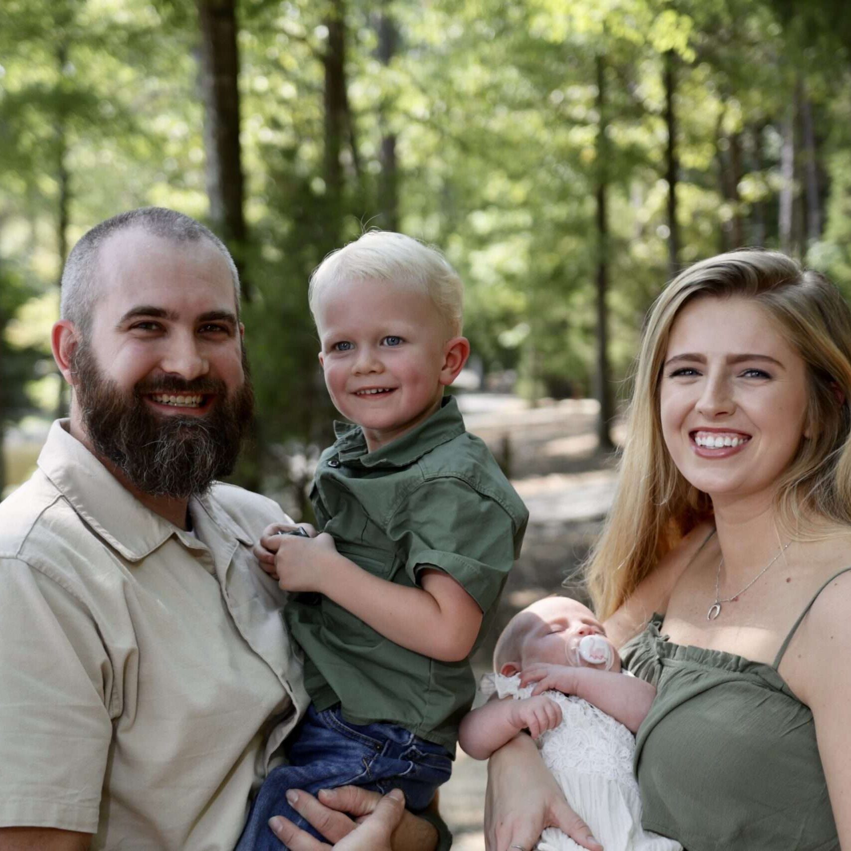 Photo of South Piedmont graduate Stanton Hall with his wife and children.