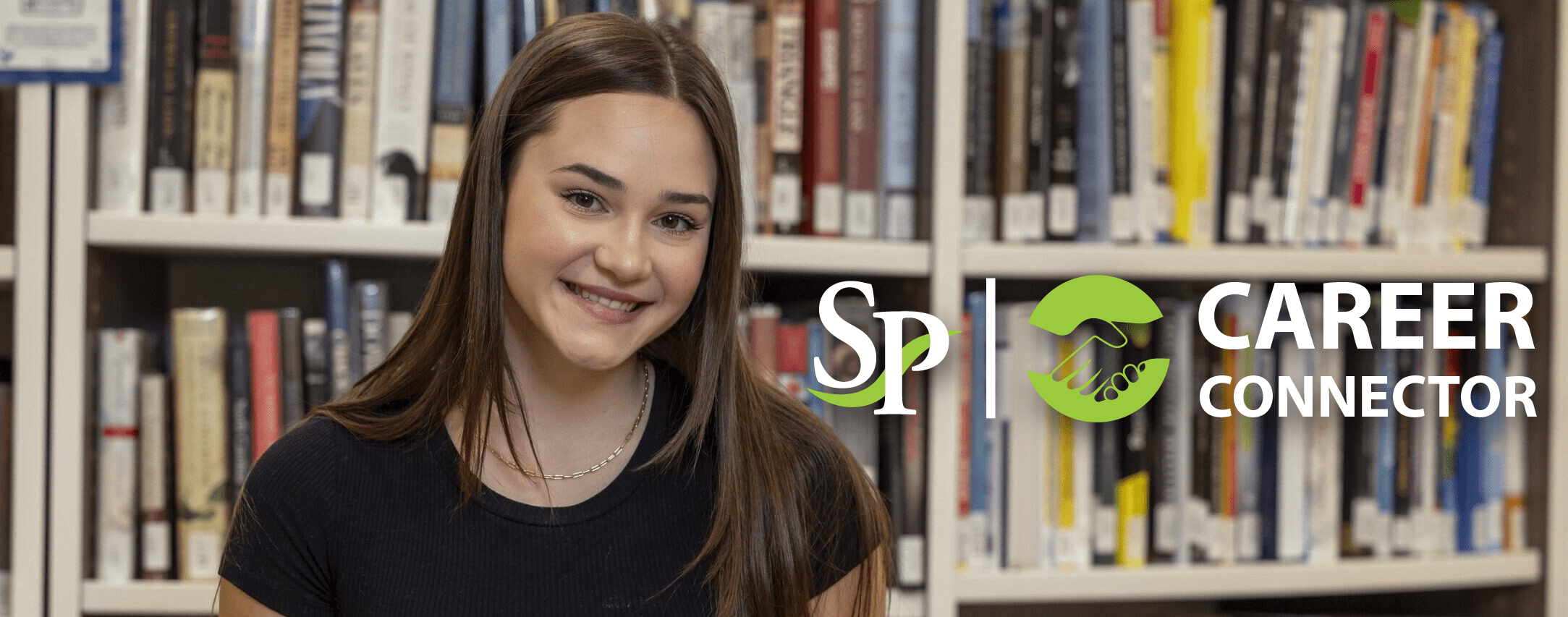 A female student sitting in front of books in the library with the Career Connector logo overlaid on the image.