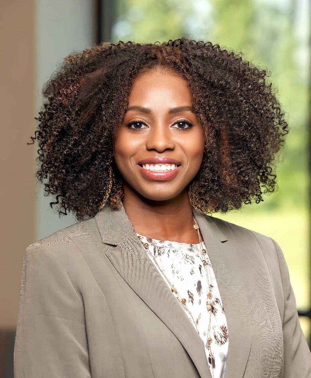 Professional headshot of Tara Moss.