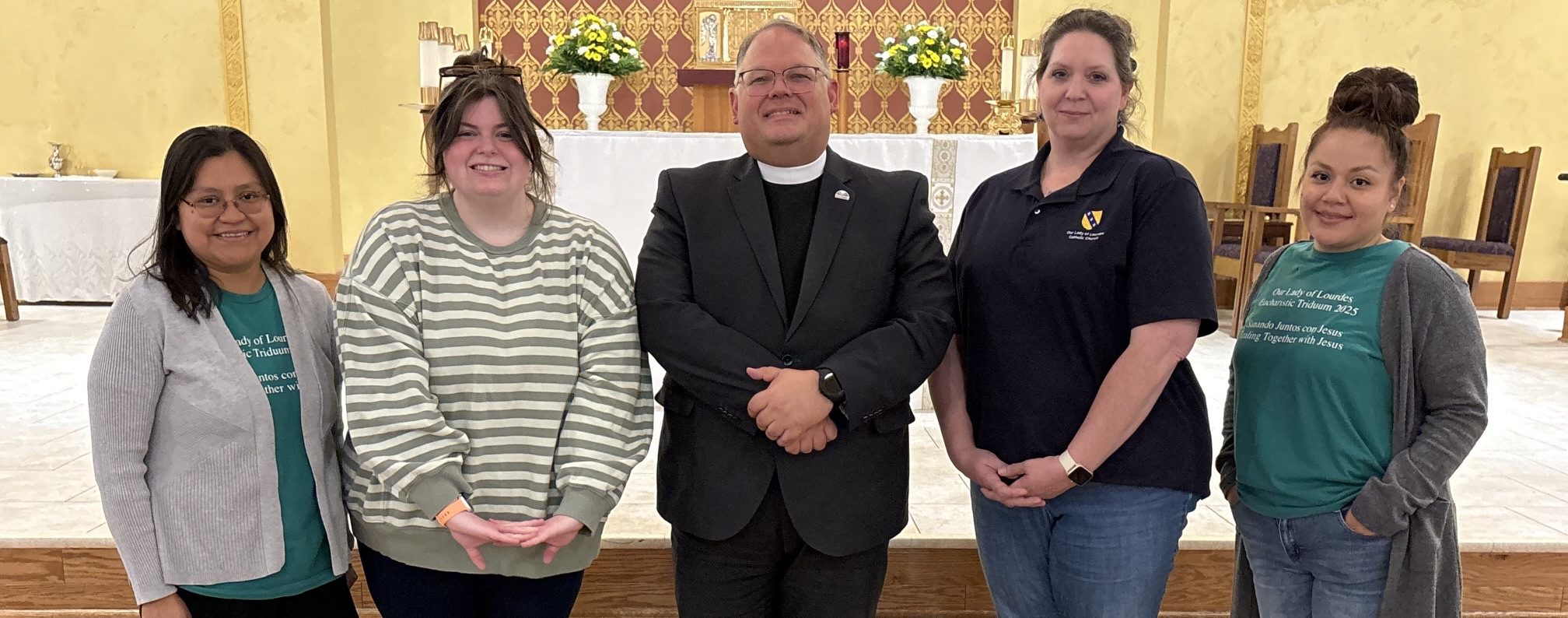 From left, Our Lady of Lourdes Administrative Assistant Laura Flores, South Piedmont Recruitment Specialist Maggie Essenmacher, Our Lady of Lourdes Pastor Benjamin Roberts, Director of Communication, Development and Faith Formation Ariel Matera and Assistant for Finance and Planning Mayra Mendoza. Our Lady of Lourdes is sponsoring up to 10 parishioners to take South Piedmont's Community Health Worker program.