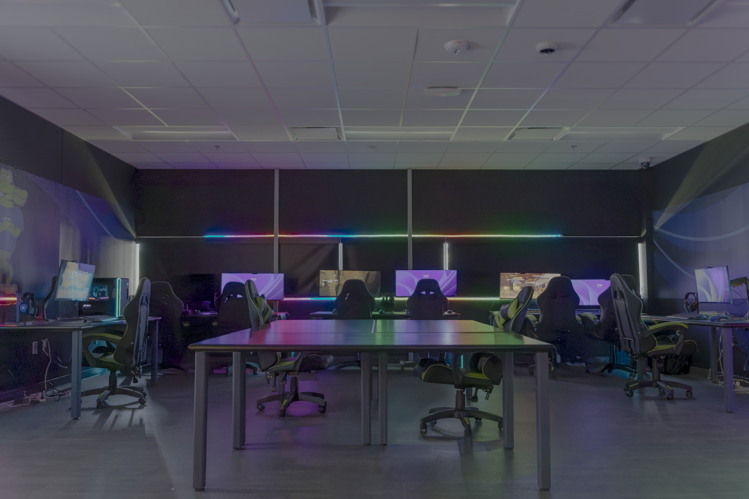 Interior image of dedicated esports gaming room at South Piedmont Community College, filled with gaming desktop setups.
